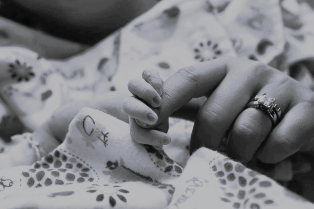 After the loss of Erin and Tony Maroon's daughter, Ashlie, they understood the importance of "When Every Moment Matters".  Ashlie's Embrace helps families experiencing stillbirth and infant loss by providing bereavement cooling units to hospitals across the country, giving families the precious gift of time.  Photo shown is of Ashlie and Erin's hands, as Erin held her after she was stillborn in 2015. 